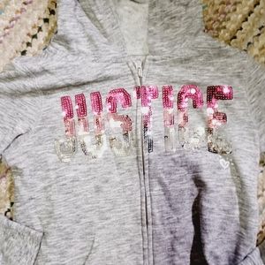 Justice zip up sweatshirt.